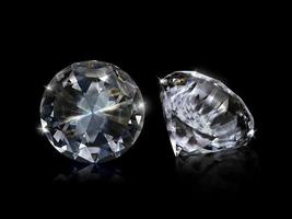 Dazzling diamond on black background photo