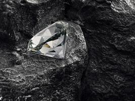 diamond on black coal background photo