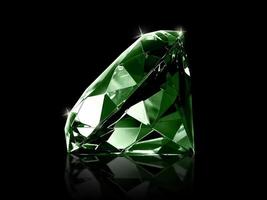 Dazzling diamond Green gemstones on black background photo