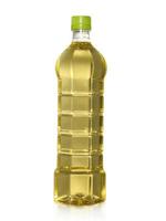 A bottle of Palm kernel Cooking Oil, isolated on white background photo