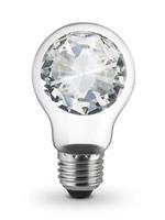 Diamond inside lightbulb. Brilliant idea concept, isolated on white background photo