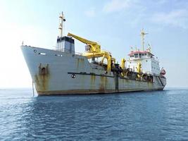 A huge ship heading for a port photo