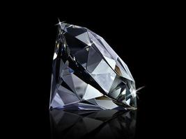 Dazzling diamond on black background photo