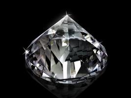 Dazzling diamond on black background photo