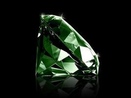 Dazzling diamond Green gemstones on black background photo