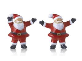 Santa claus Cute ceramic dolls statues decorations in Merry Christmas with on white background photo