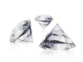 Dazzling diamond on white background photo