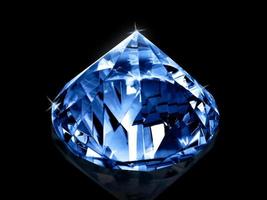 Dazzling diamond Blue gemstones on black background photo