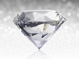 Dazzling diamond on white shining bokeh background. concept for selection best diamond gem design photo