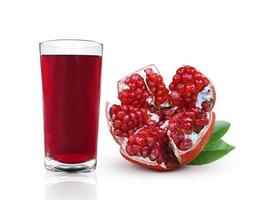 Pomegranate juice and pomegranate fruit isolated on a white background photo