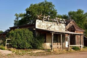 Boarded and Abandoned Buildings in a Ghost Town photo