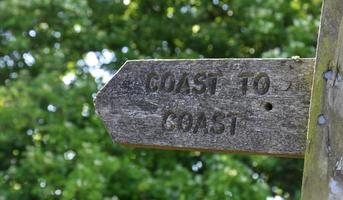 Up Close Look at a Wood Coast to Coast Sign photo