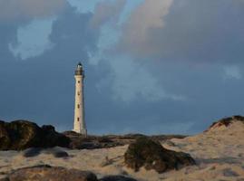 Noord Aruba Lighthouse with Scenic Surrounding Landscape photo