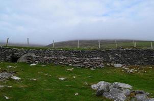 Ruins of Beehive Huts in Ireland photo