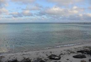 Very Gentle Waves Along the Shore of Aruba photo