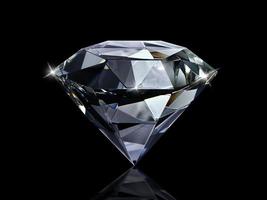 Dazzling diamond on black background photo