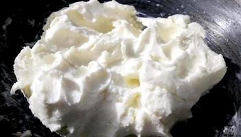 Homemade white Butter or Makhan, Makkhan, served in a bowl. selective focus photo