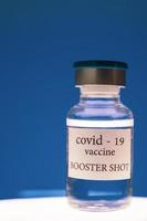 COVID-19 booster vaccine vial. Medicine and health care concept photo