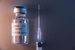 COVID-19 booster vaccine vial. Medicine and health care concept photo