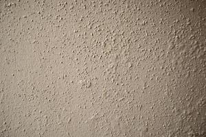 Paint peeling plaster walls because of its use for a long time. Alternatively, use quality color to paint the walls. Must be repaired in order to come back again. photo