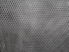 torn steel grate background grey color photo