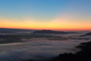 Great views of Sunrise with mountains and cloud. photo