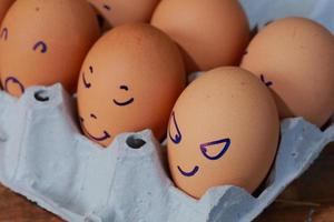 Emotion of fresh eggs  on a straw. photo