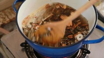chinese herbs Chinese herbal medicine derived from nature for example, mushrooms, roots, leaves in boil in the pot . video