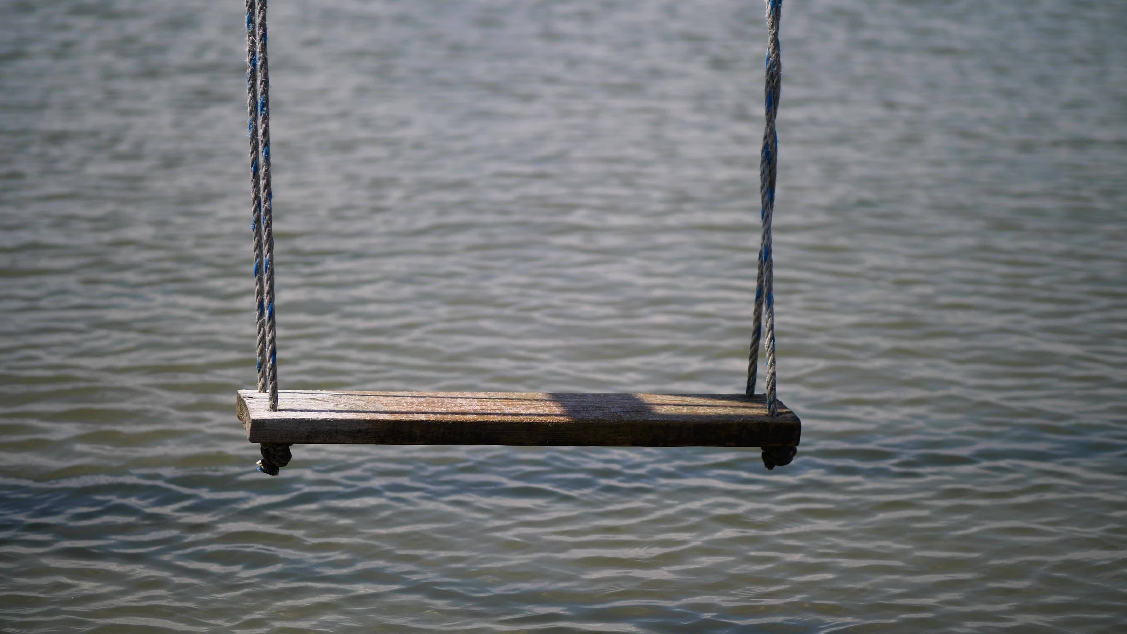 swing over water on ropes. vacation at the resort 9156846 Stock Video at  Vecteezy