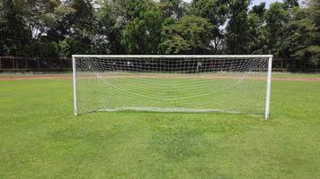 Aerial drone shot of a turf net in around soccer field video