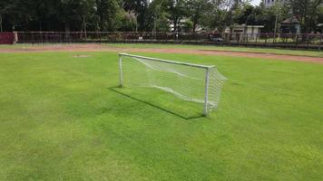 Aerial drone shot of a turf net in around soccer field video