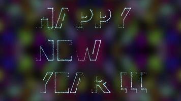 en video där inskriptionen gott nytt år framgår av små gnistrande partiklar