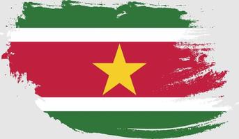 Suriname flag with grunge texture vector