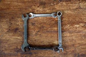 Old tools on a wooden table photo