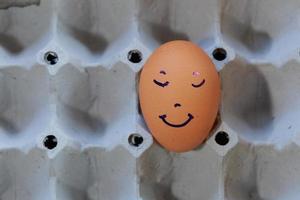 Emotion of fresh eggs  on a straw. photo