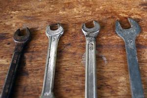 Old tools on a wooden table photo