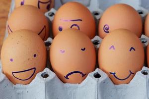 Emotion of fresh eggs  on a straw. photo