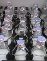 Lab bottles shaking liquid tissue microbial culture photo