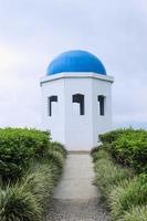 Aesthetic white building with blue dome photo