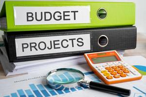 Budget and Projects. Binder data finance report business with graph analysis in office. photo