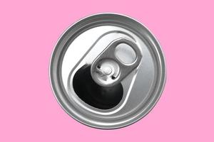 Top view of a opened soft drink can,The opened cans of soft drinks are made of aluminum and have light on the shiny surface on isolate. photo