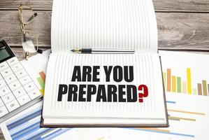 Are You Prepared Question sign on notepad on the white background photo