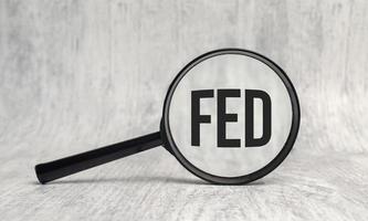 Magnifier on a white background, inside the text is written - FED photo