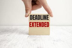 three wooden blocks with the words dEADLINE EXTENDED photo