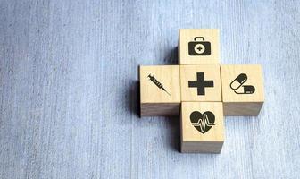 wooden block arrangement with healthcare medical icons Maintenance photo