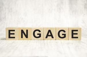 the word of ENGAGE on building blocks concept photo