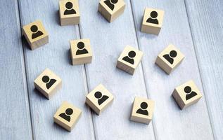 Wooden blocks on blue background. Teamwork, network and community concept. photo