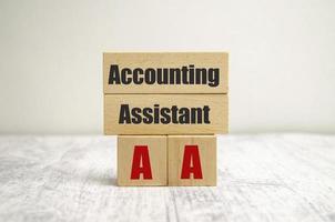 accounting assistant words on wooden blocks and white background photo