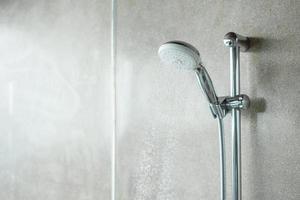 shower head with wall background in modern bathroom photo