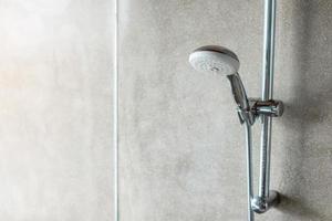 shower head with wall background in modern bathroom photo